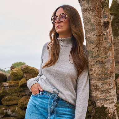 Woman wearing a cashmere zip jumper