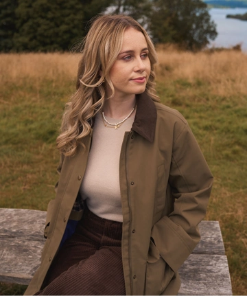 Georgia wearing Lands' End green jacket and cord jeans